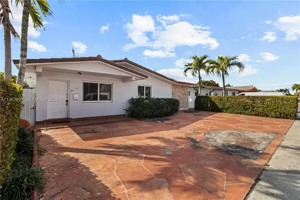 a view of a house with a patio