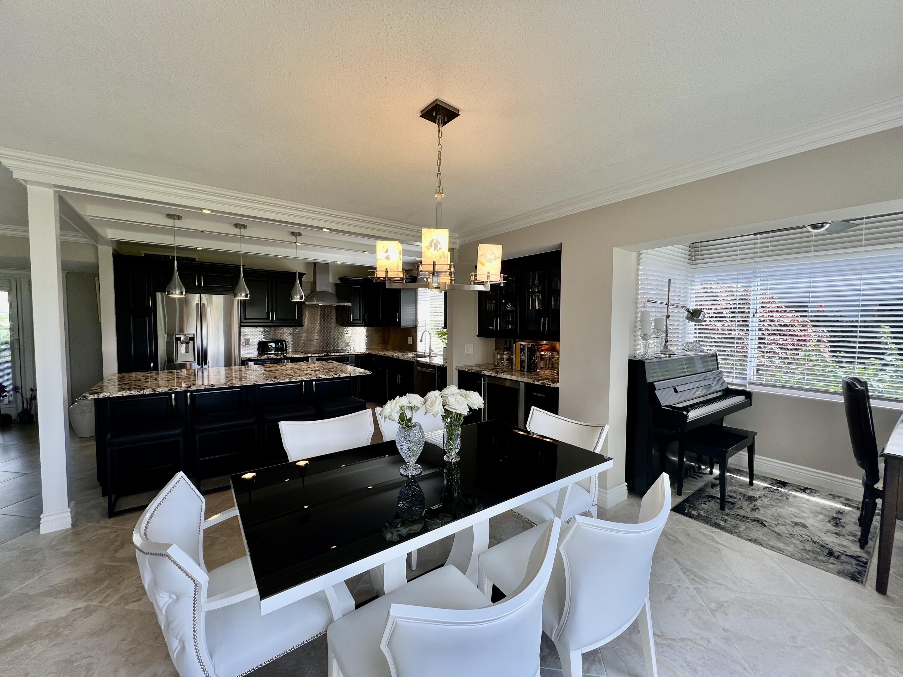 3658 North Quail Ridge Drive, Unit GREEN HERON S Boynton Beach, FL 33436 - Photo 14 of 55 Dining Area