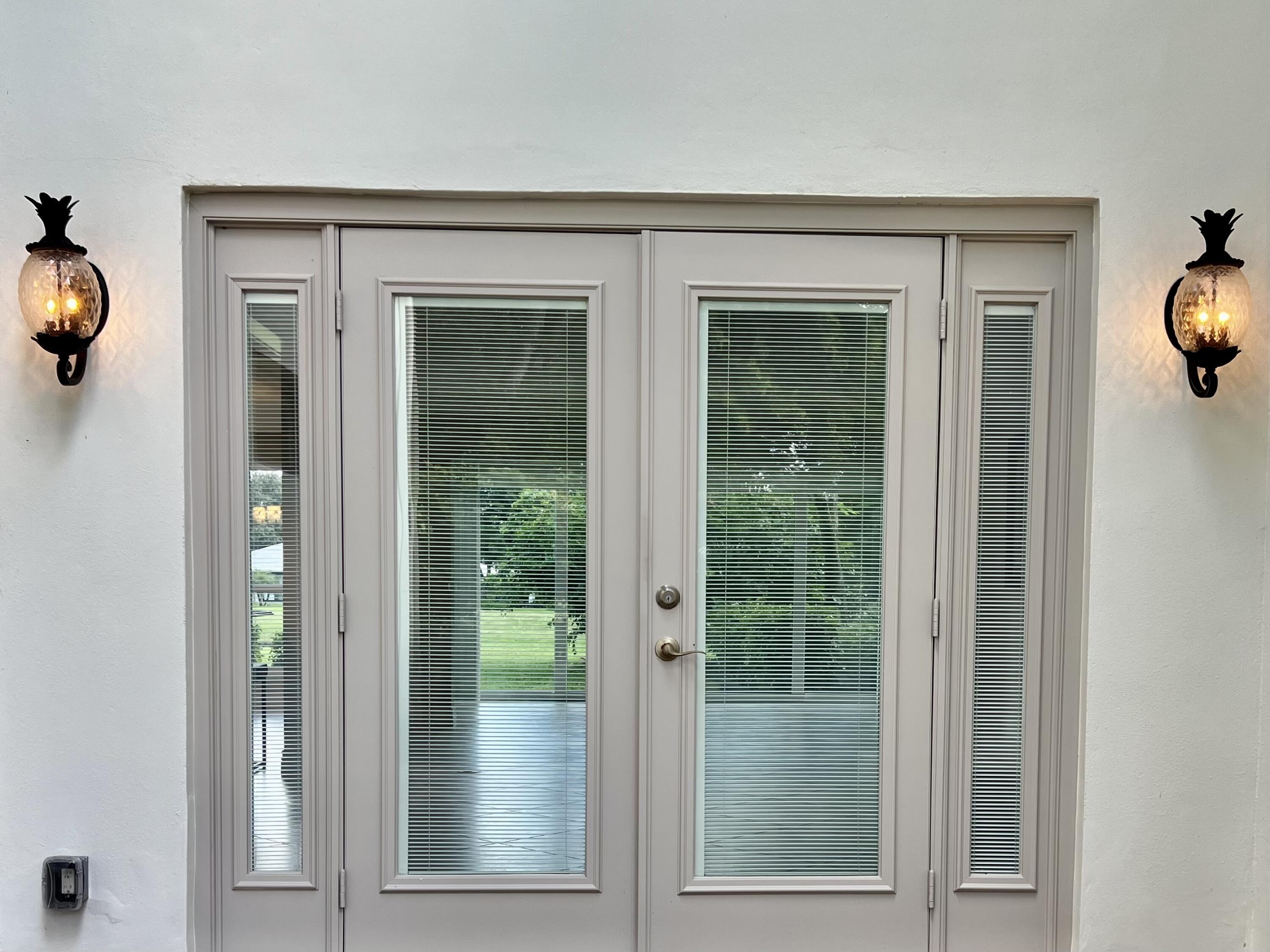 3658 North Quail Ridge Drive, Unit GREEN HERON S Boynton Beach, FL 33436 - Photo 25 of 55 French doors from patio