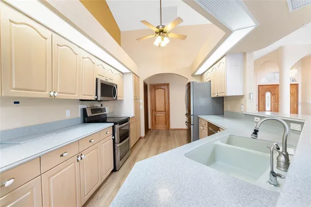 a bathroom with a double vanity sink and mirror