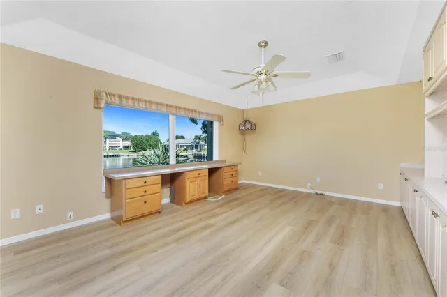 a view of a swimming pool with a porch