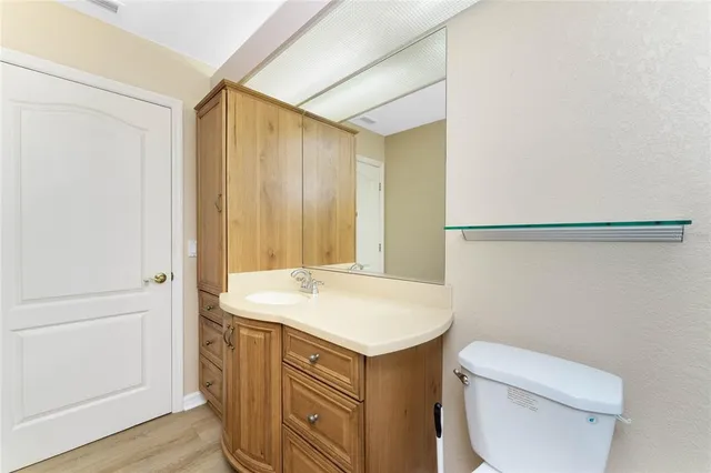 a view of a swimming pool with an outdoor seating