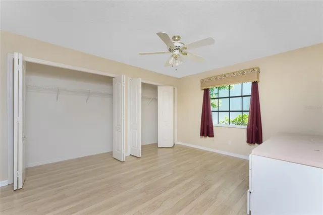 an aerial view of a house with a swimming pool yard and outdoor seating
