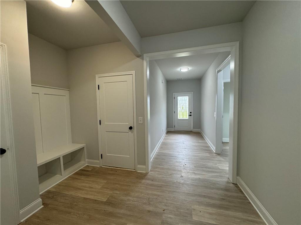 2057 North Hicks Road Toccoa, GA 30577 - Photo 19 of 23 a view of hallway with wooden floor