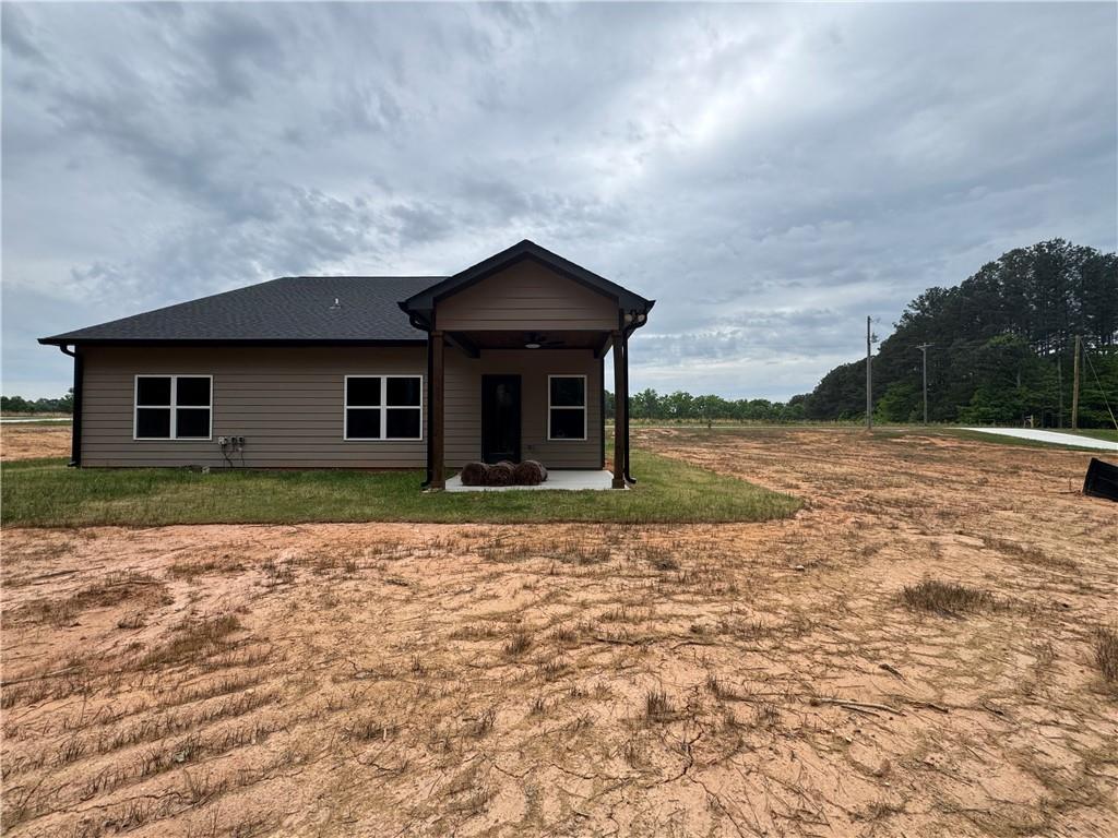 2057 North Hicks Road Toccoa, GA 30577 - Photo 23 of 23 a front view of a house with garden