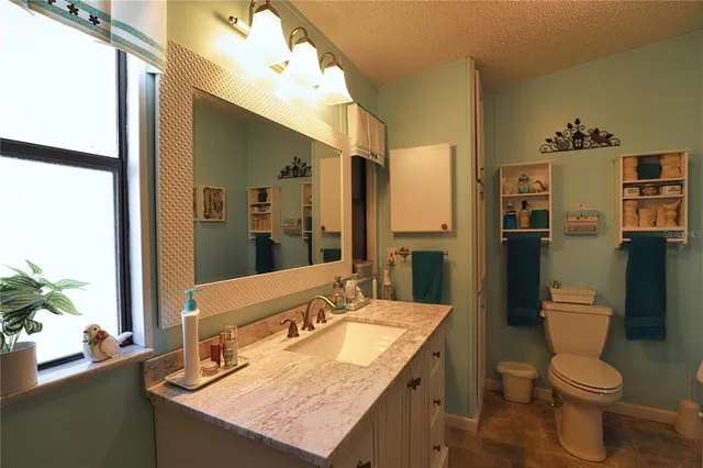 a front view of a house with a yard and porch