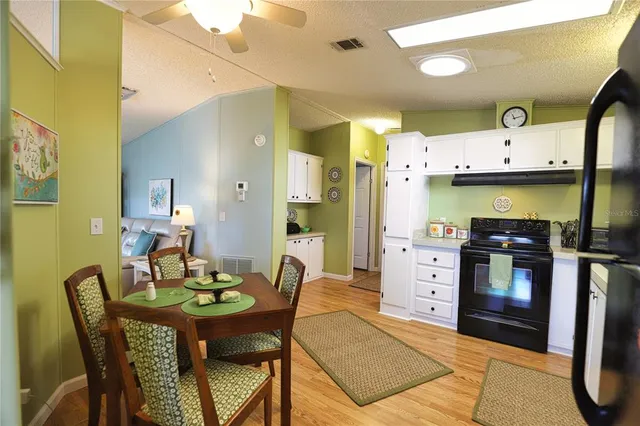 a view of a dining room with furniture