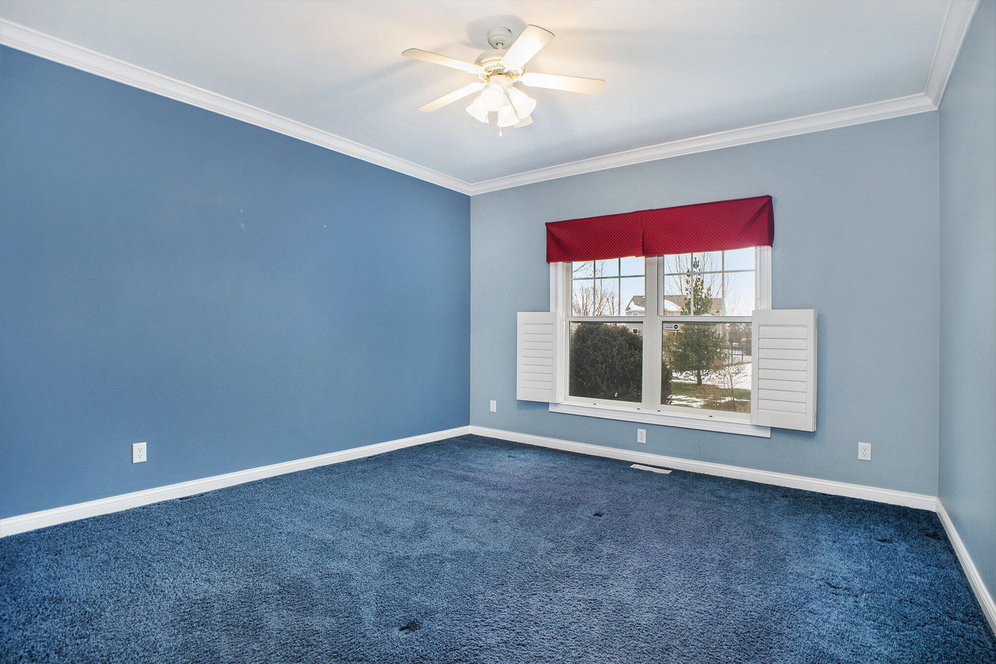 10198 California Street Crown Point, IN 46307 - Photo 14 of 41 a view of an empty room with a window