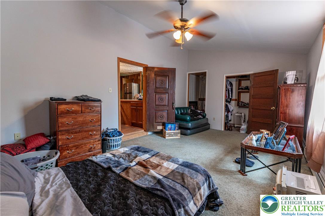 2485 Hieter Road Quakertown, PA 18951 - Photo 67 of 97 Relax under the vaulted ceiling in this generously proportioned bedroom with convenient closet access.