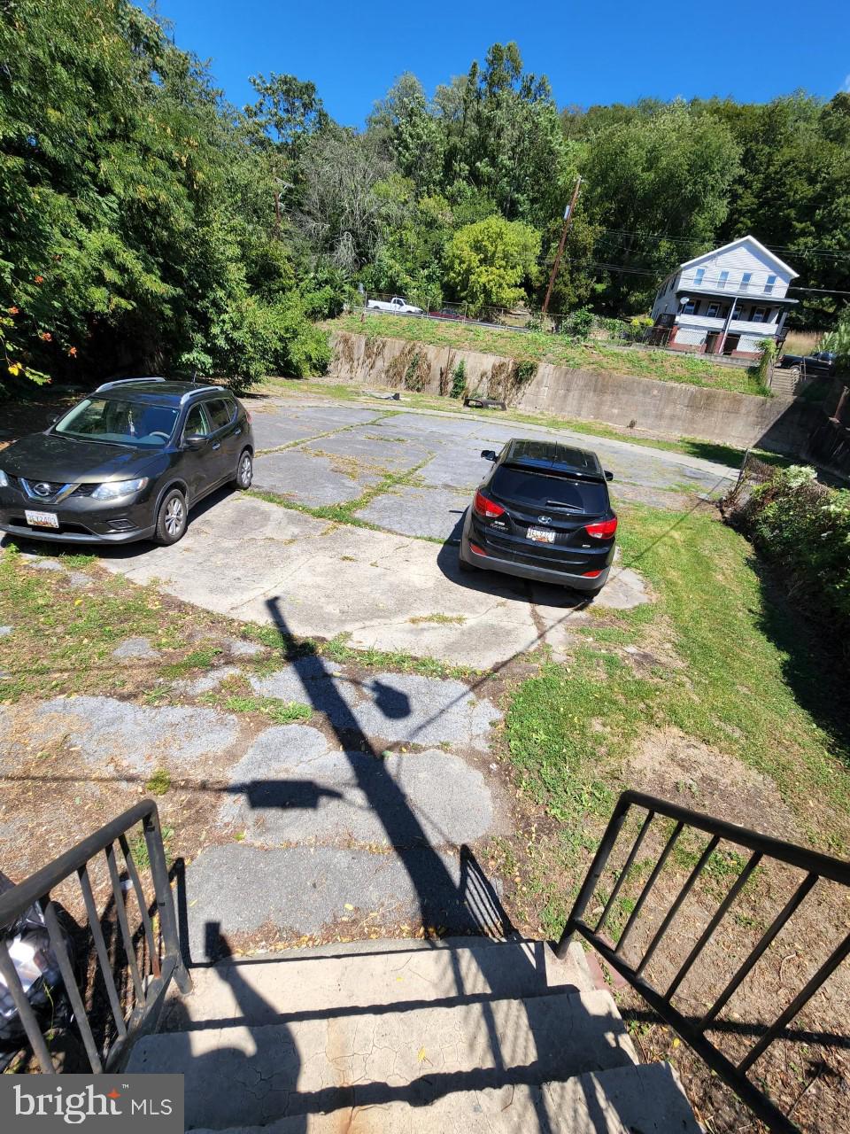 311 Columbia Street, Unit 8 Cumberland, MD 21502 - Photo 13 of 13 a view of a backyard and swimming pool