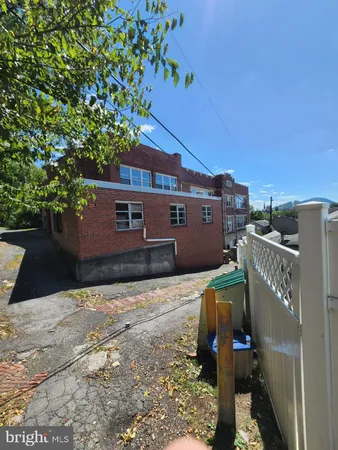 a view of a porch with a yard