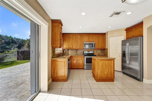 $579,000 | 20840 Northwest 14th Street, Pembroke Pines, FL 33029