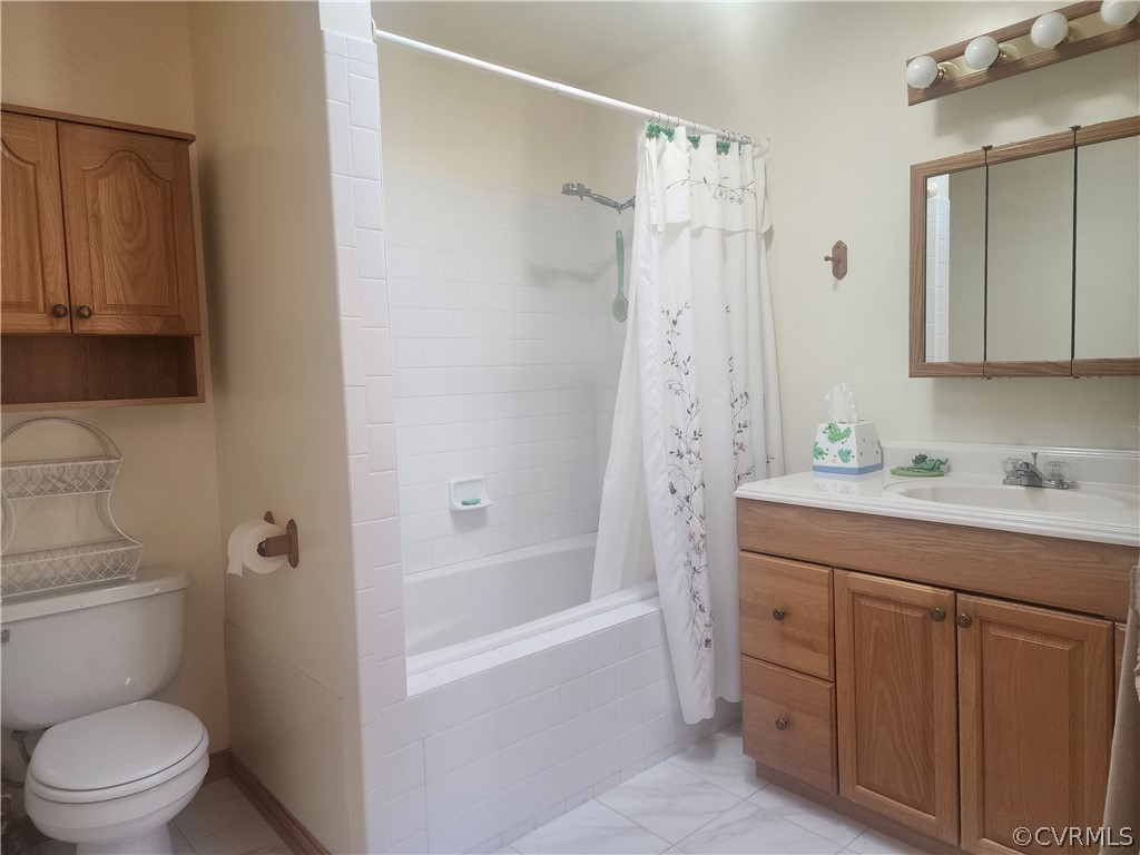 20802 Beaver Dam Road Beaverdam, VA 23015 - Photo 18 of 49 a bathroom with a granite countertop sink a toilet and shower