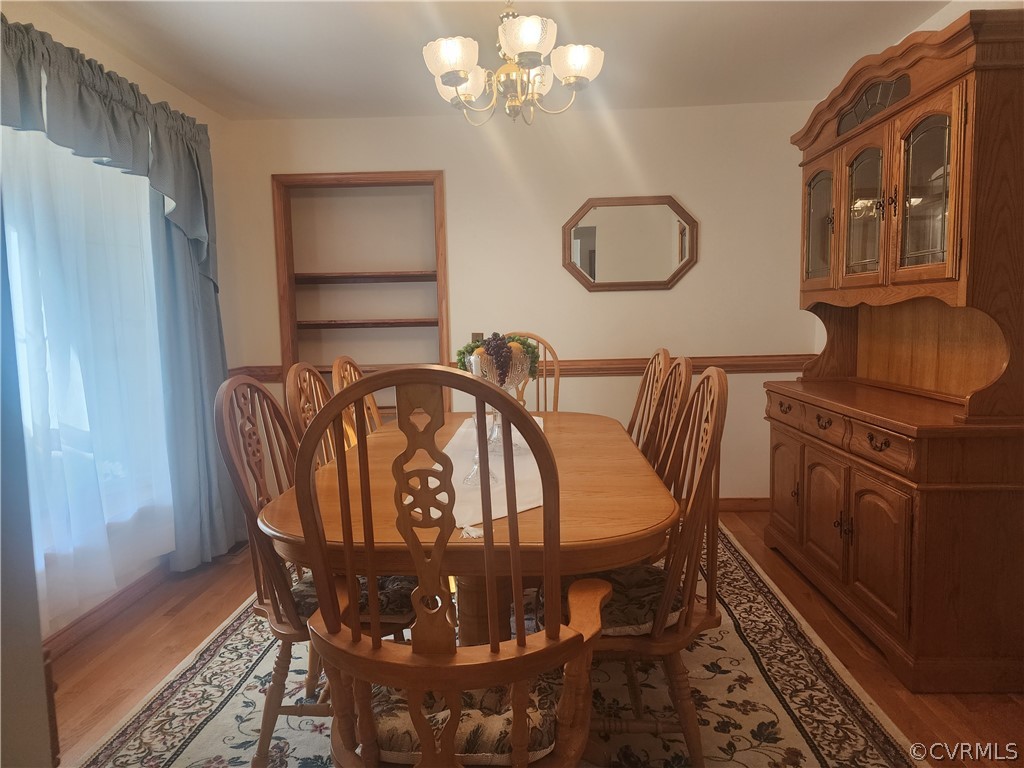 20802 Beaver Dam Road Beaverdam, VA 23015 - Photo 3 of 49 a view of a dining room with furniture and chandelier