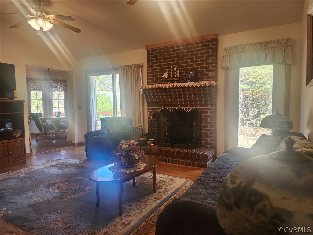 20802 Beaver Dam Road Beaverdam, VA 23015 - Photo 10 of 49 a living room with furniture a window and a fireplace
