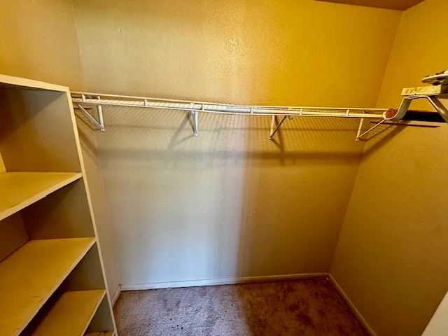 a view of small space with racks on the wall