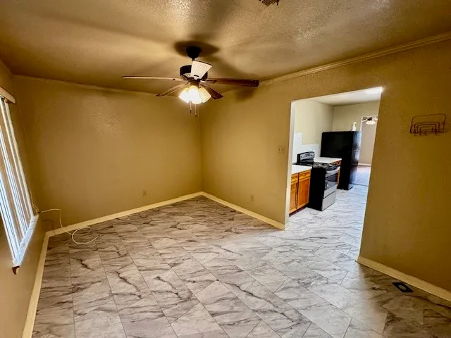a view of a hallway with a chandelier