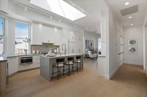 a kitchen with sink cabinets and counter space