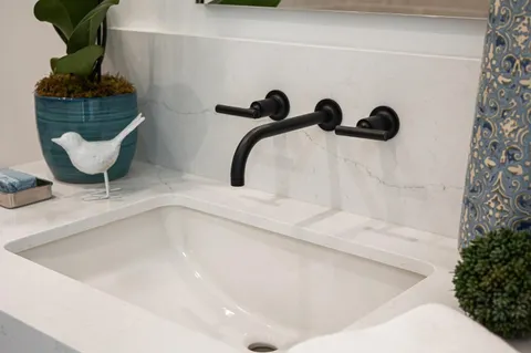 a bath tub sitting next to a bathroom