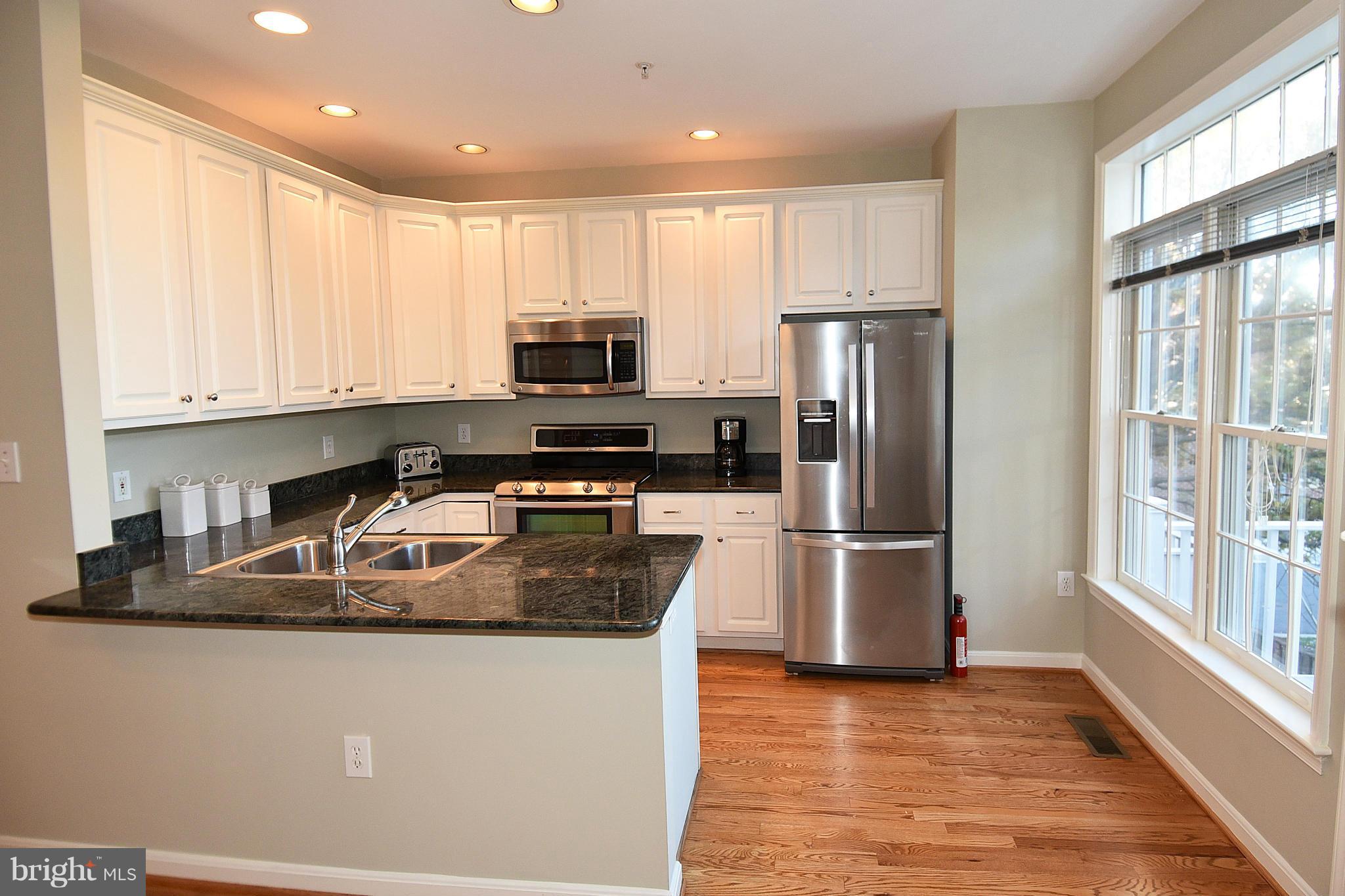 4098 21st Road North Arlington, VA 22207 - Photo 8 of 30 Granite Counters and Gas Range