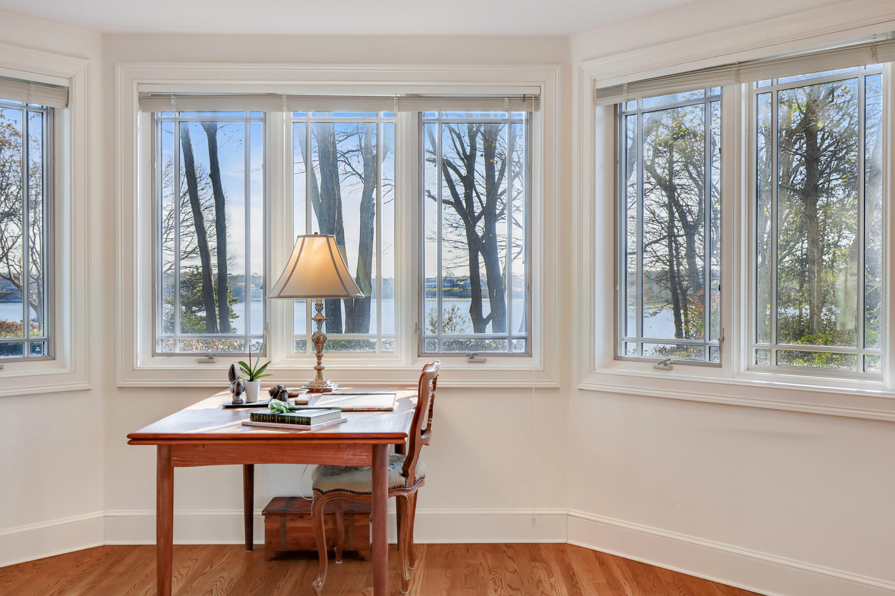 108 Little River Road Cotuit, MA 02635 - Photo 21 of 59 a view of a room with a large window and dining table