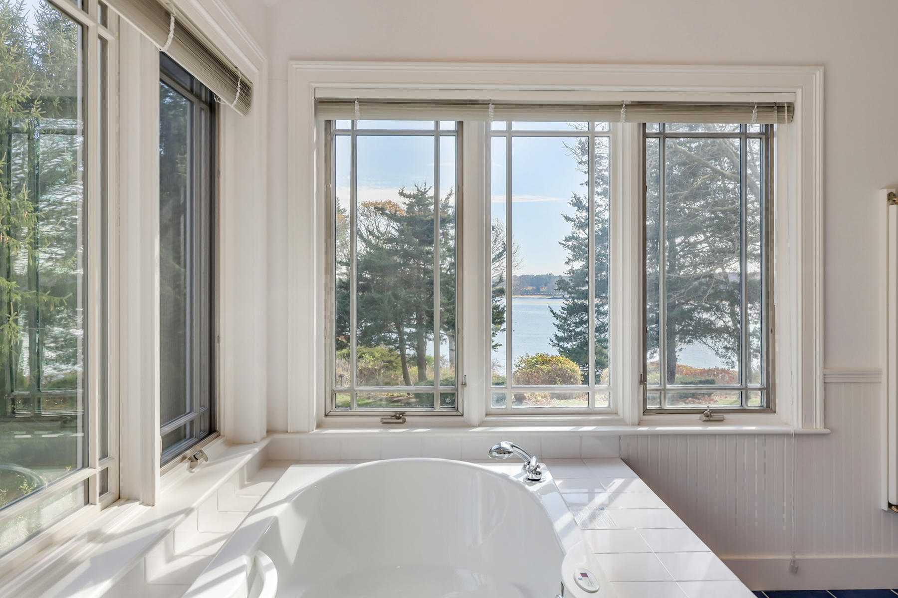 108 Little River Road Cotuit, MA 02635 - Photo 39 of 59 a bath tub sitting in front of a window