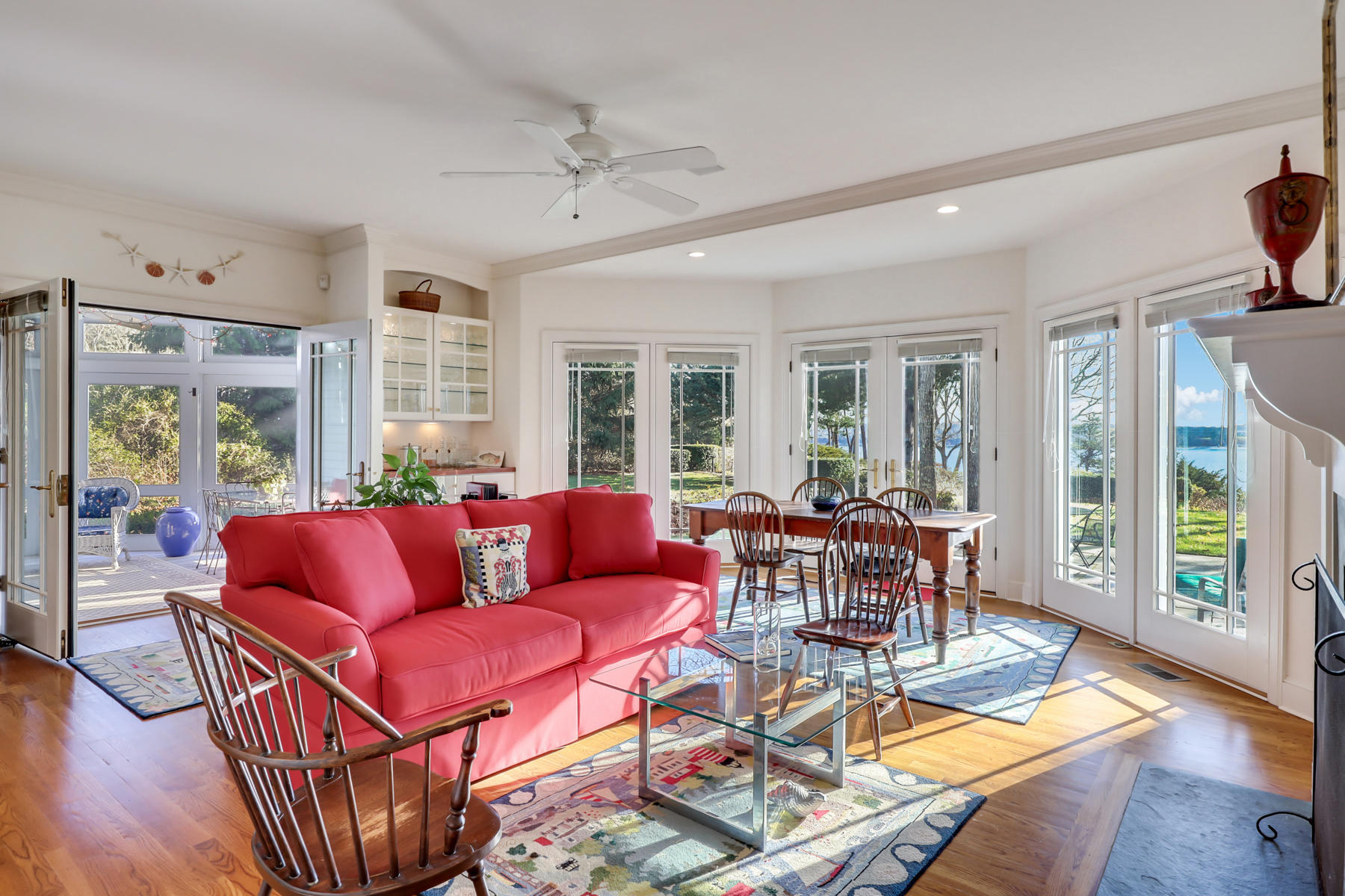108 Little River Road Cotuit, MA 02635 - Photo 7 of 59 a living room with furniture and wooden floor