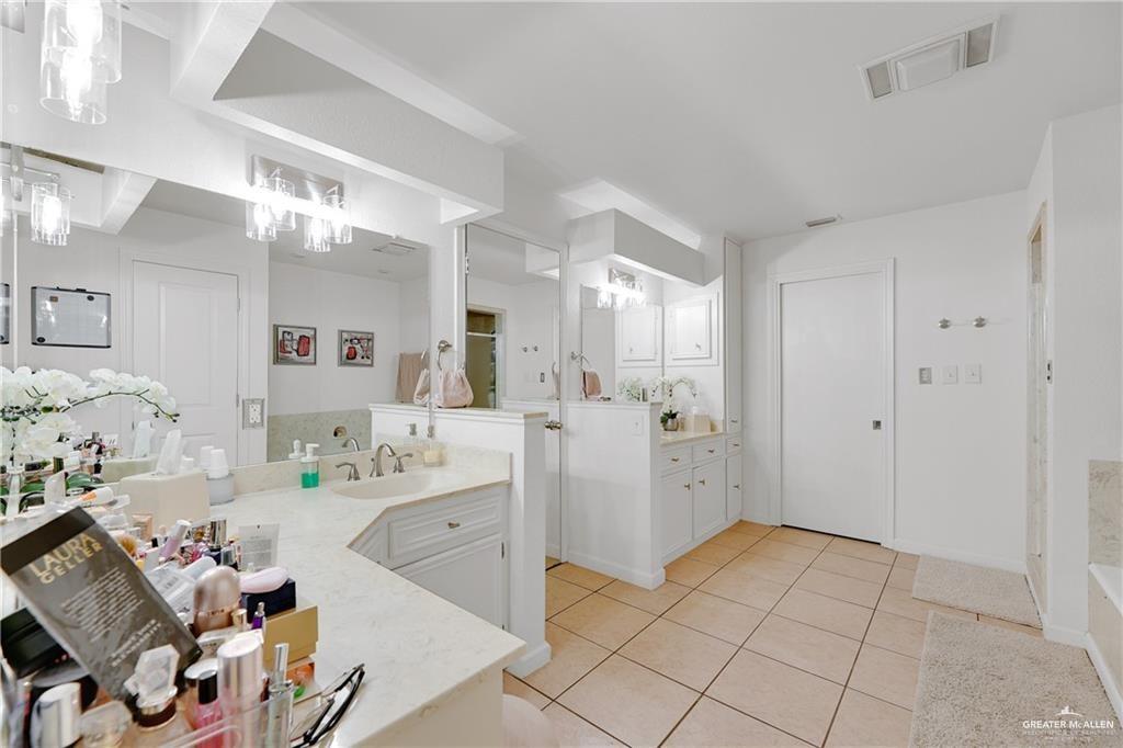 2036 South 5th Street, Unit 8 McAllen, TX 78503 - Photo 20 of 27 a view of a kitchen and utility room