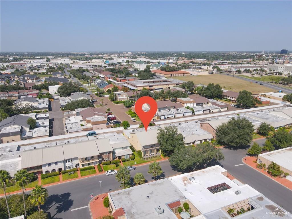 2036 South 5th Street, Unit 8 McAllen, TX 78503 - Photo 24 of 27 an aerial view of a house with a swimming pool and outdoor seating