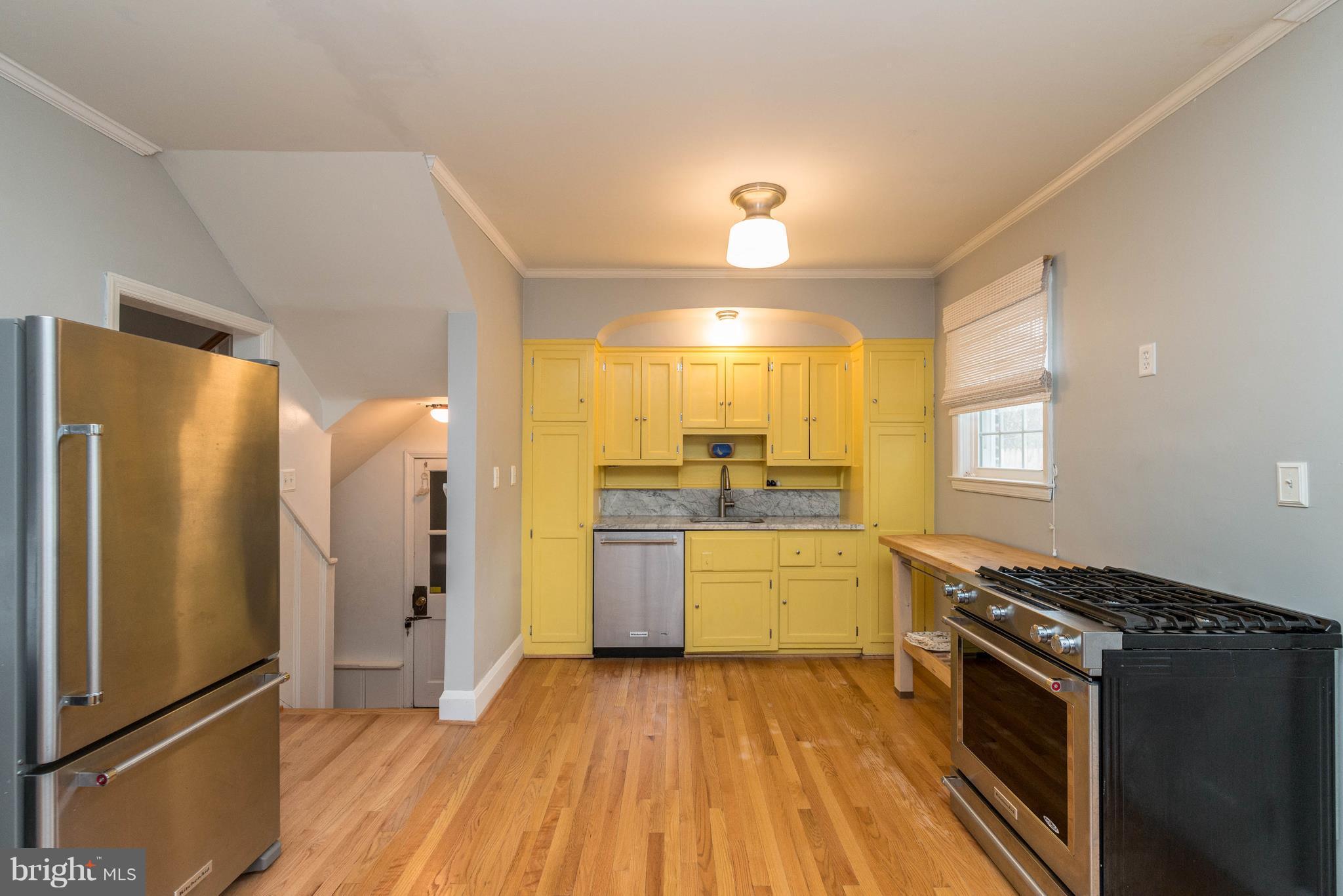 720 Dunkirk Road Baltimore, MD 21212 - Photo 11 of 29 Original cabinets in kitchen