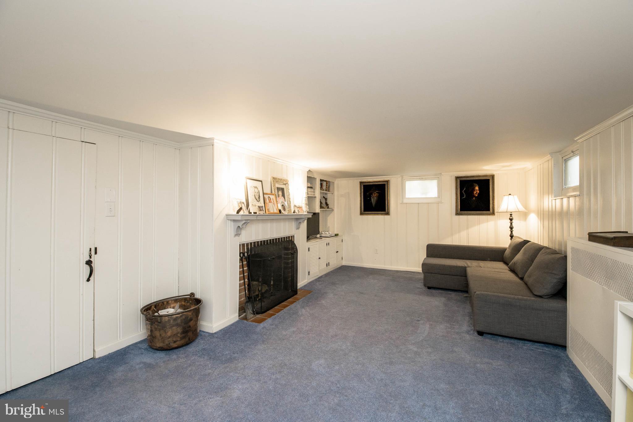 720 Dunkirk Road Baltimore, MD 21212 - Photo 5 of 29 Family Room with wood burning fireplace