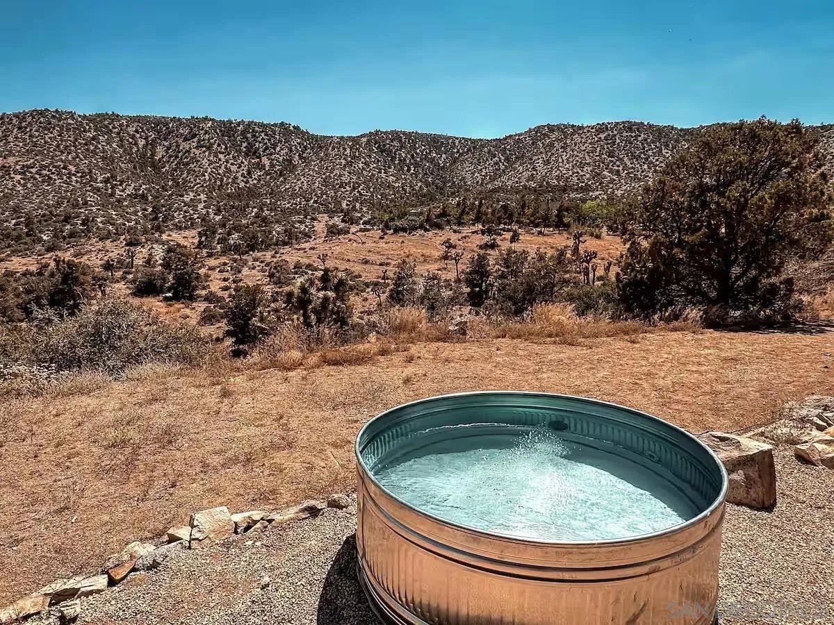 48311 Burns Canyon Road Pioneertown, CA 92268 - Photo 33 of 52 a view of outdoor space and swimming pool