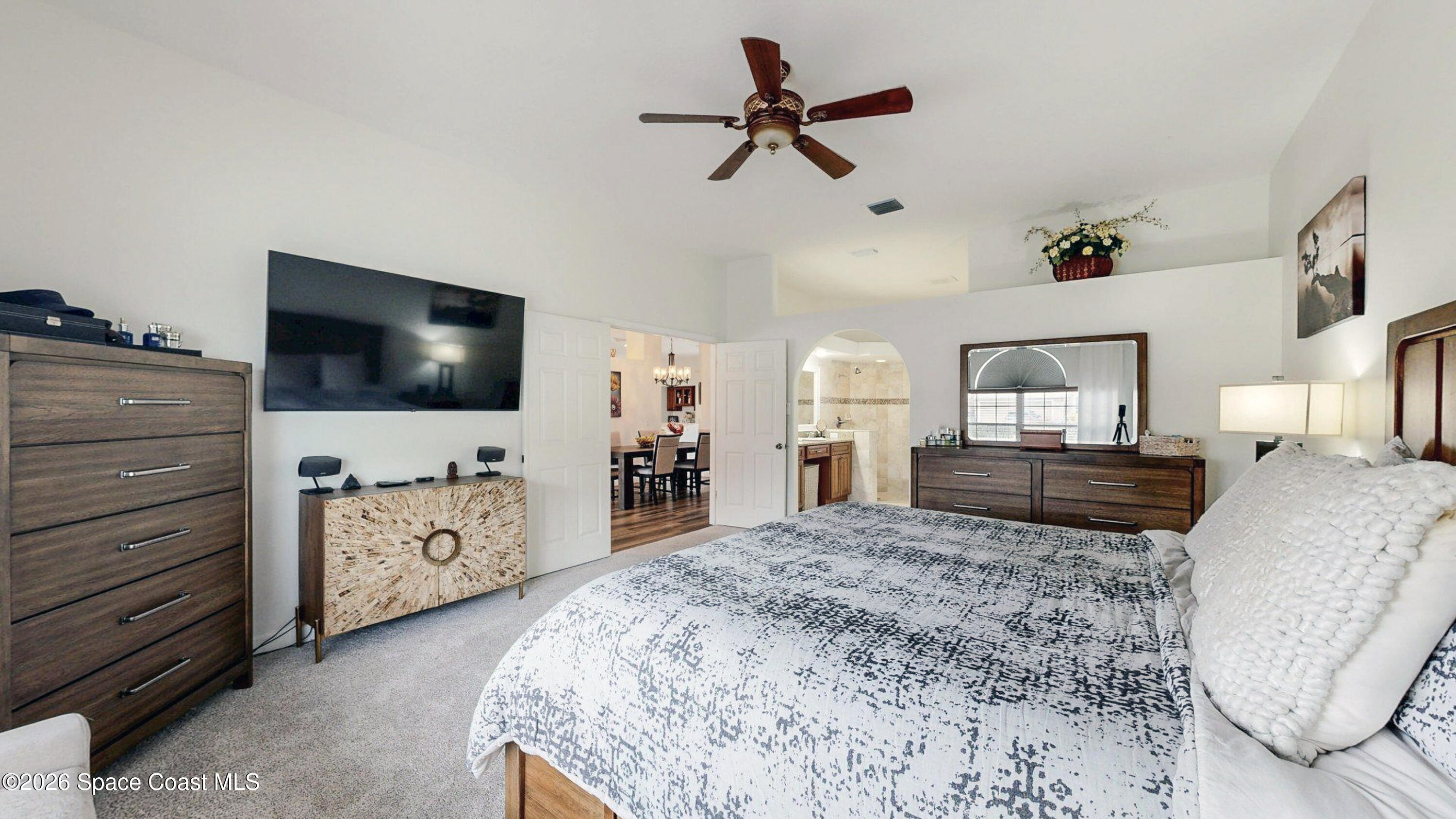 786 Conestee Drive Melbourne, FL 32904 - Photo 13 of 38 a living room with furniture and a flat screen tv