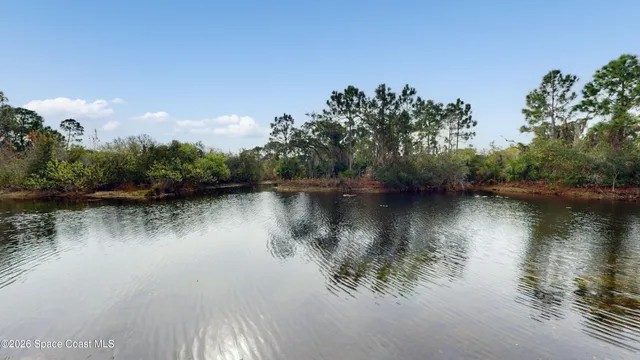 a view of a lake with houses