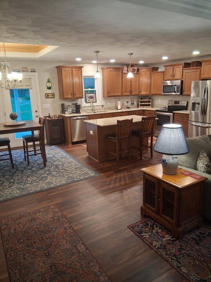 2348 East Ruritan Road Roanoke, VA 24012 - Photo 20 of 31 a kitchen with stainless steel appliances granite countertop a stove a sink a refrigerator and a microwave