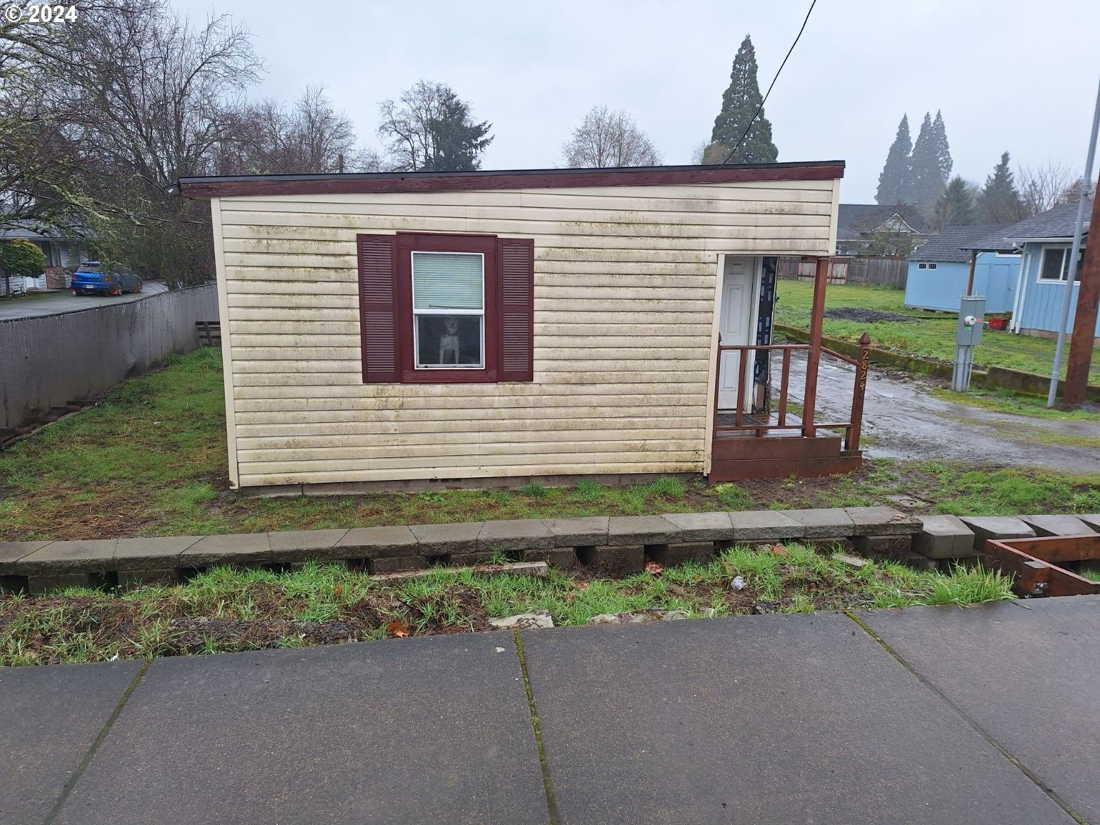 2824 19th Avenue Forest Grove, OR 97116 - Photo 2 of 10 a front view of a house with a yard