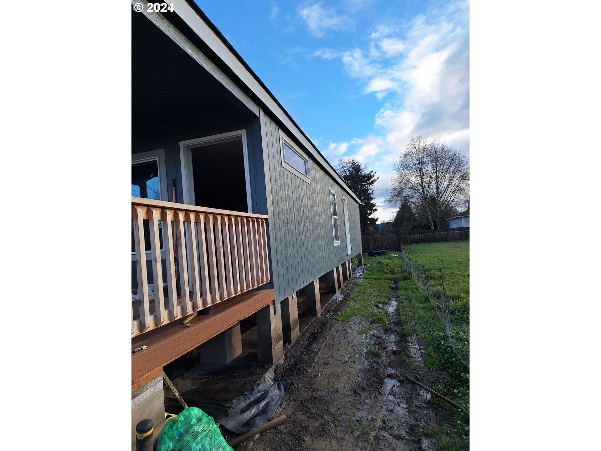2824 19th Avenue Forest Grove, OR 97116 - Photo 8 of 10 a view of a balcony with wooden fence and floor