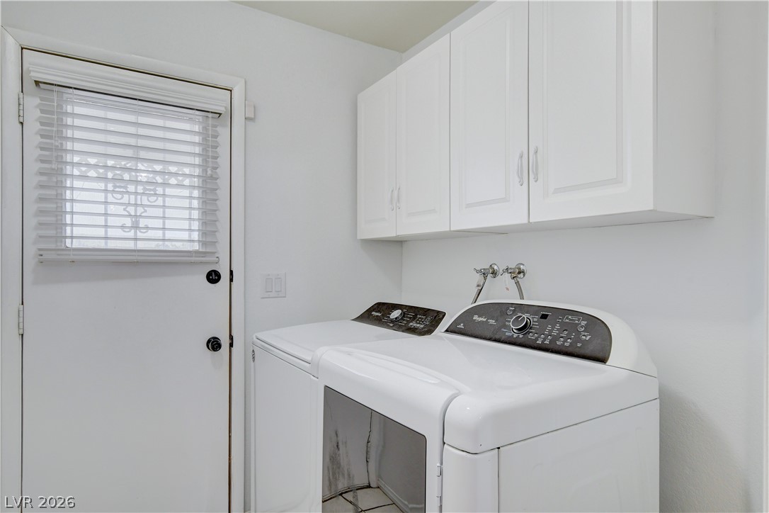 337 Washoe Way Henderson, NV 89074 - Photo 19 of 20 Laundry room with cabinet space and separate washer and dryer