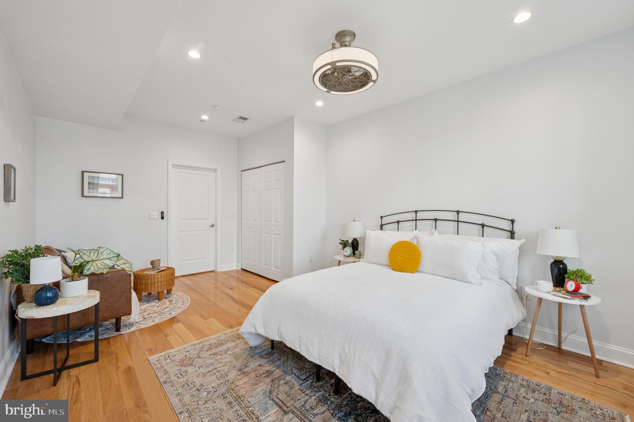 3263 Chatham Street Philadelphia, PA 19134 - Photo 22 of 46 a bedroom with a bed a table and chair