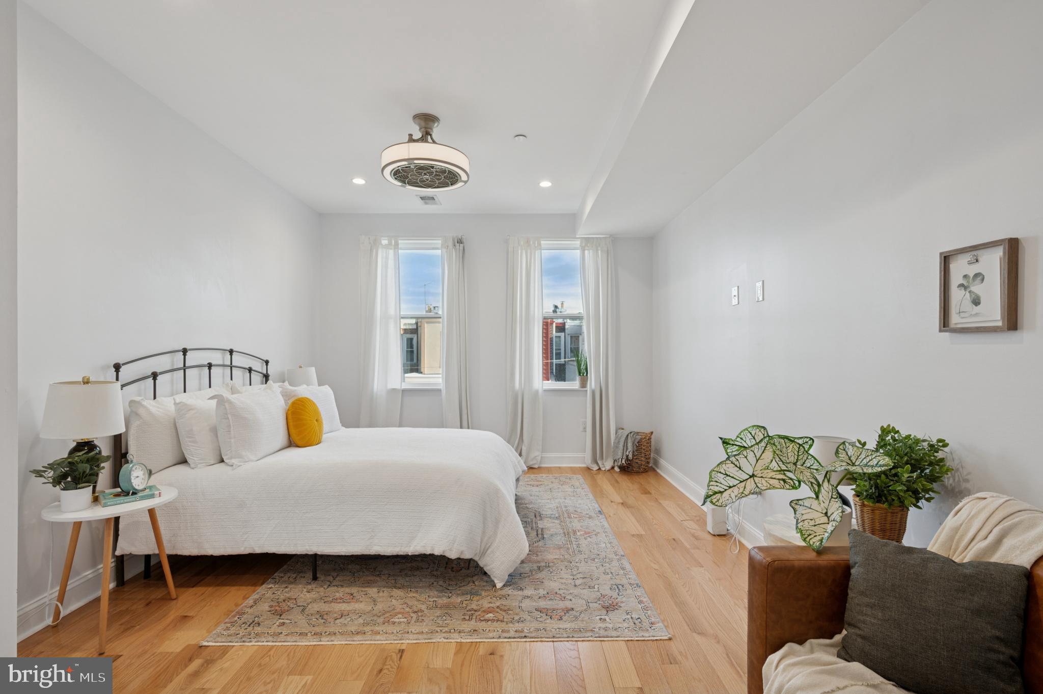 3263 Chatham Street Philadelphia, PA 19134 - Photo 23 of 46 a bedroom with a bed and a couch