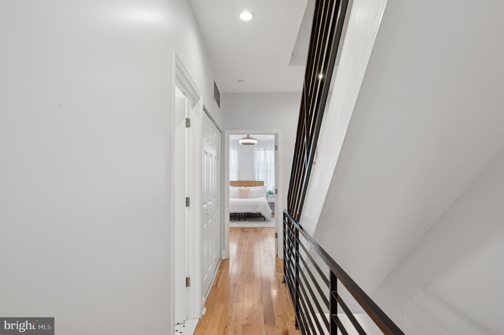 3263 Chatham Street Philadelphia, PA 19134 - Photo 29 of 46 a view of a hallway with wooden floor and staircase