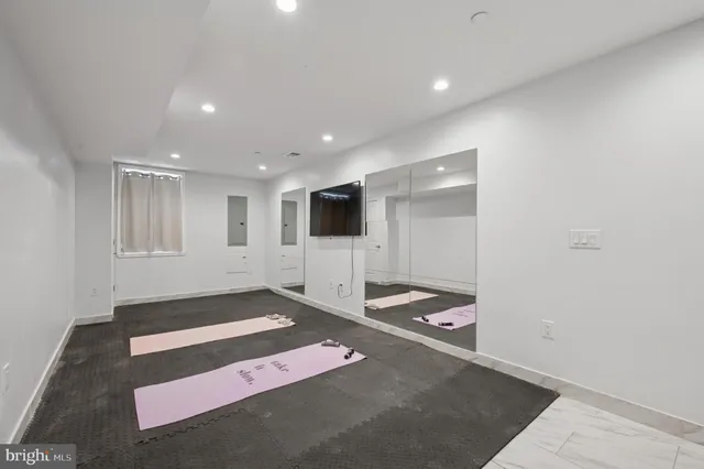 a workspace with furniture and window