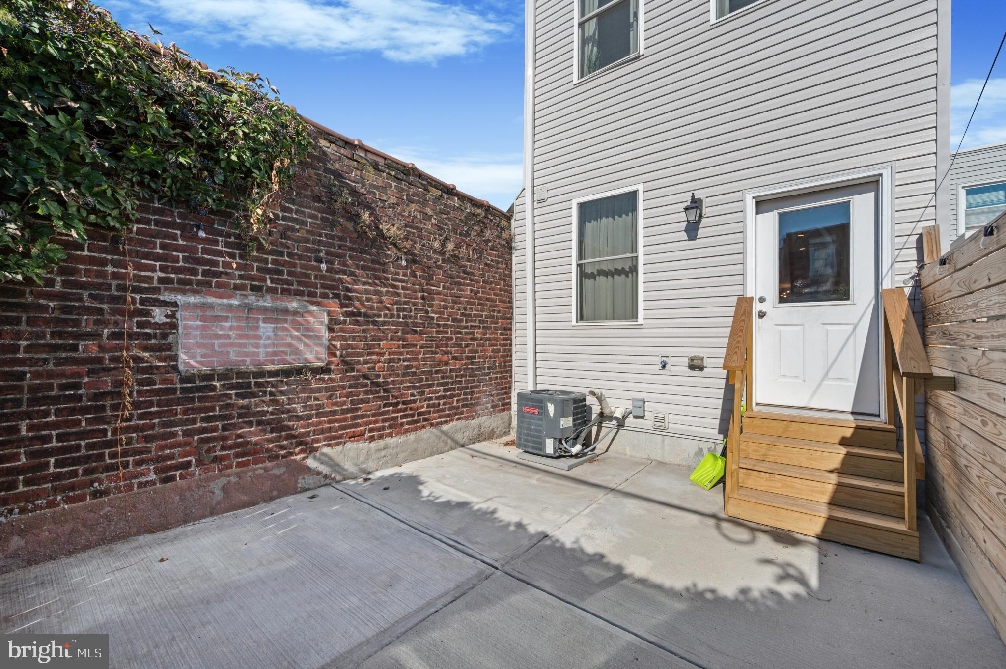 3263 Chatham Street Philadelphia, PA 19134 - Photo 39 of 46 a view of a patio with table and chairs and potted plants