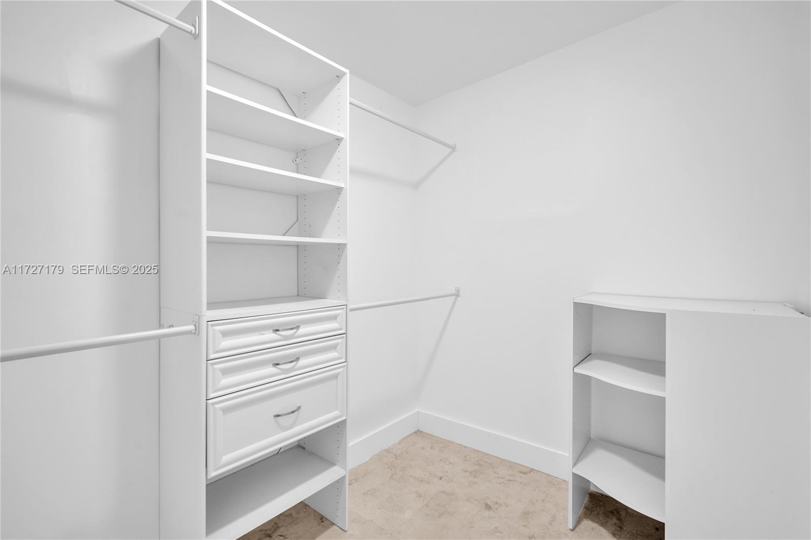 2372 Northwest 34th Street Miami, FL 33142 - Photo 23 of 50 a view of an empty walk in closet