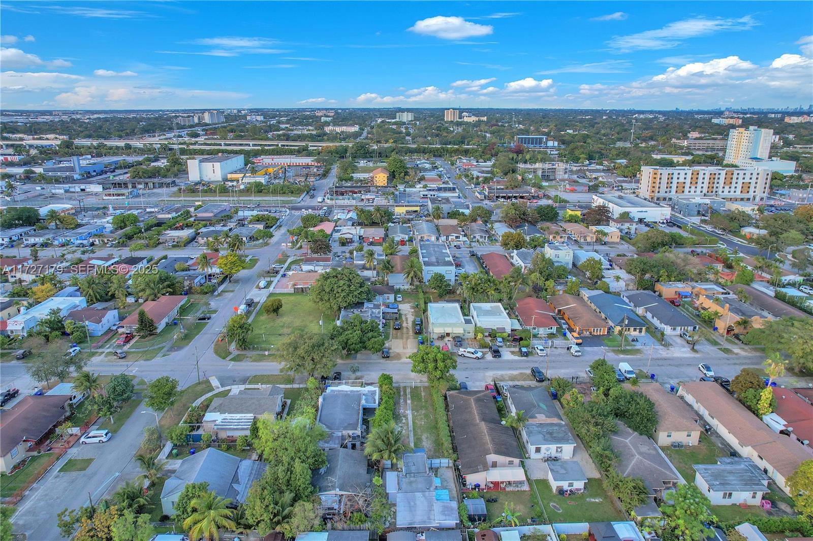 2372 Northwest 34th Street Miami, FL 33142 - Photo 38 of 50 an aerial view of residential houses with outdoor space