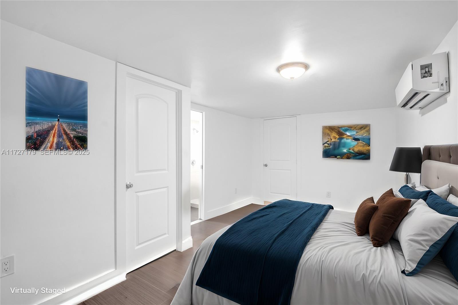 2372 Northwest 34th Street Miami, FL 33142 - Photo 5 of 50 a bedroom with a bed and a view of kitchen