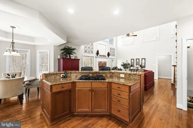 a bath tub sitting in a bathroom next to a window