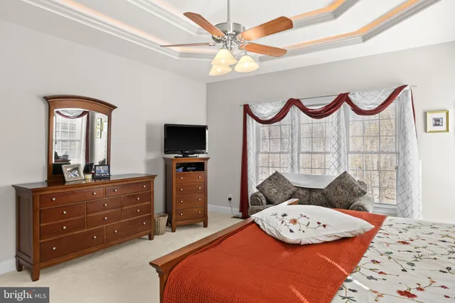 a bathroom with a shower toilet and sink