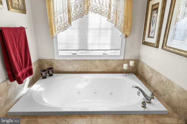 a living room with lots of furniture and a flat screen tv