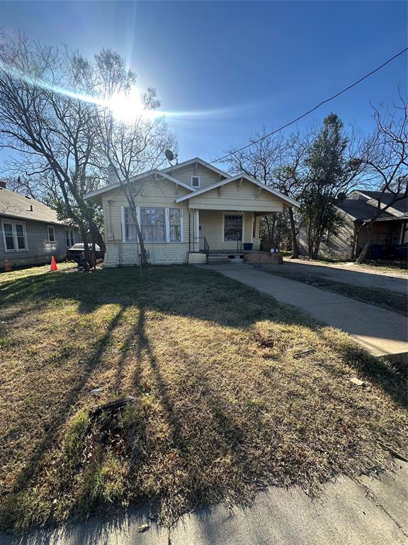 1824 Lyle Avenue Waco, TX 76708 - Photo 3 of 13 Bungalow-style home featuring a porch and a front lawn